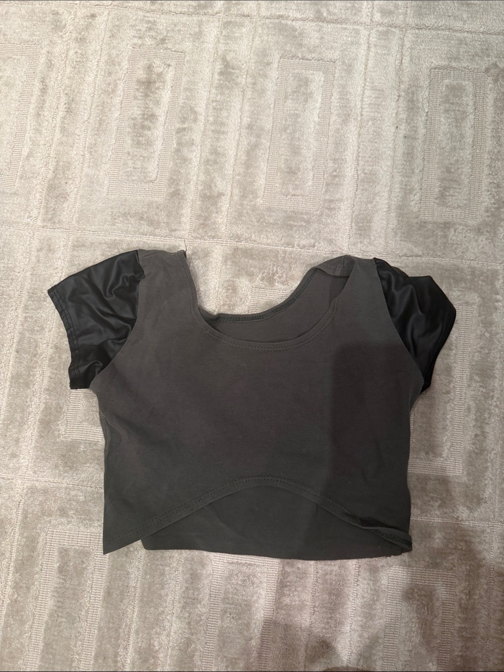Khaki crop top with black faux leather sleeves